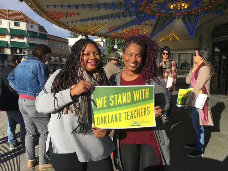 Canvassers stand with Oakland teachers